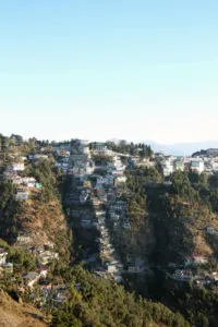Aerial view of Mussoorie spread along a forested Himalayan ridge